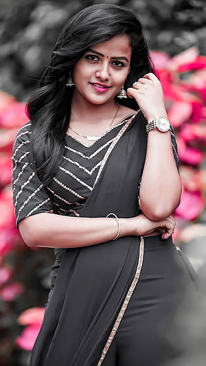 Vaishnavi Chaitanya in Black Saree with Floral Background HD phone wallpaper