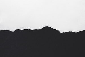 Minimalist Torn Paper Edge Texture on Black and White Background HD wallpaper