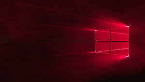 Glowing Red Windows Logo with Neon Light Beams on Dark Background HD wallpaper