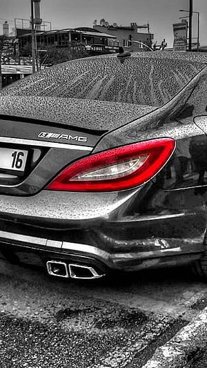Mercedes-Benz CLS 63 AMG Rear Detail with Selective Red Taillight and Dual Exhaust HD phone wallpaper