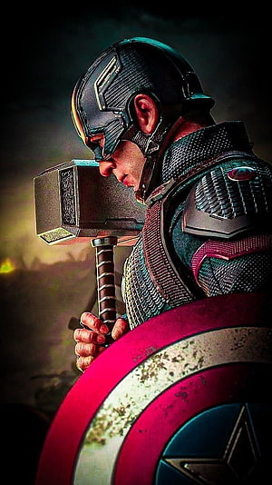 Captain America Holding Mjolnir and Shield in Dramatic Cinematic Art HD phone wallpaper