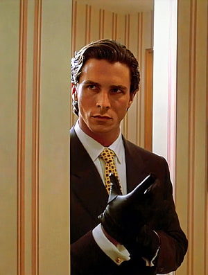 Christian Bale as Patrick Bateman in a dark suit and yellow tie from American Psycho, American psycho, dress_shirt, tie HD phone wallpaper