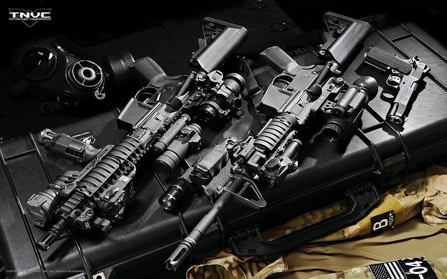 Tactical Assault Rifles and Military Gear Arranged on Black Case HD wallpaper