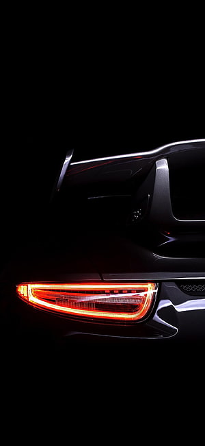 Porsche GT3 Rear Taillight and Spoiler Detail in Dark Studio Lighting HD phone wallpaper