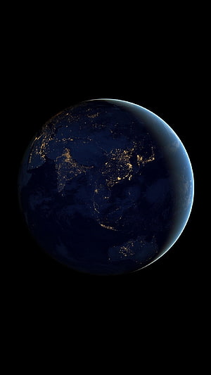 Earth at Night from Space with City Lights Illuminating the Dark Globe HD phone wallpaper