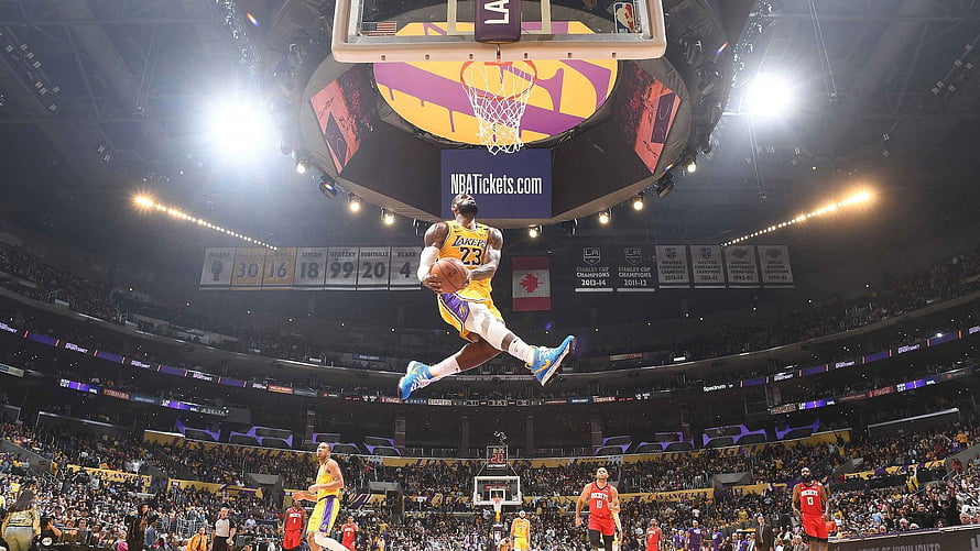 LeBron James Mid-Air Dunk at Los Angeles Lakers Home Court HD wallpaper