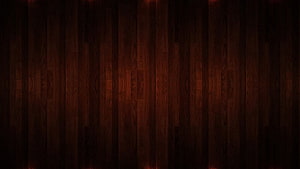 Dark Brown Wood Plank Texture with Rich Grain Patterns and Moody Atmosphere HD wallpaper