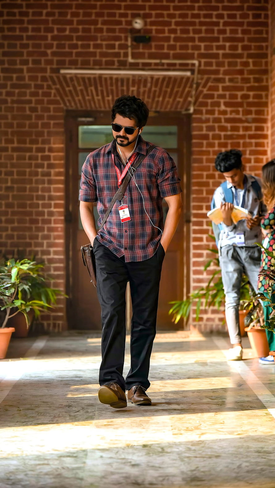 Vijay Sethupathi in Master Walking Through Brick Corridor with Sunglasses and Plaid Shirt HD phone wallpaper