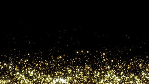Golden Sparkles and Bokeh Particles on a Deep Black Background HD wallpaper