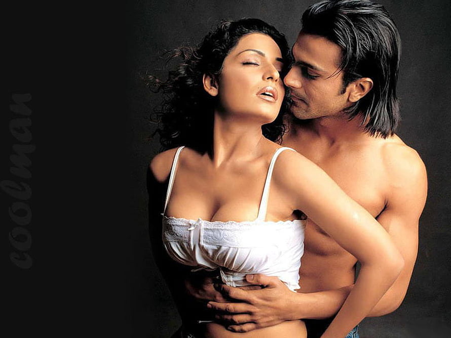 Romantic Couple Embrace in White Lingerie Against Dark Studio Background HD wallpaper