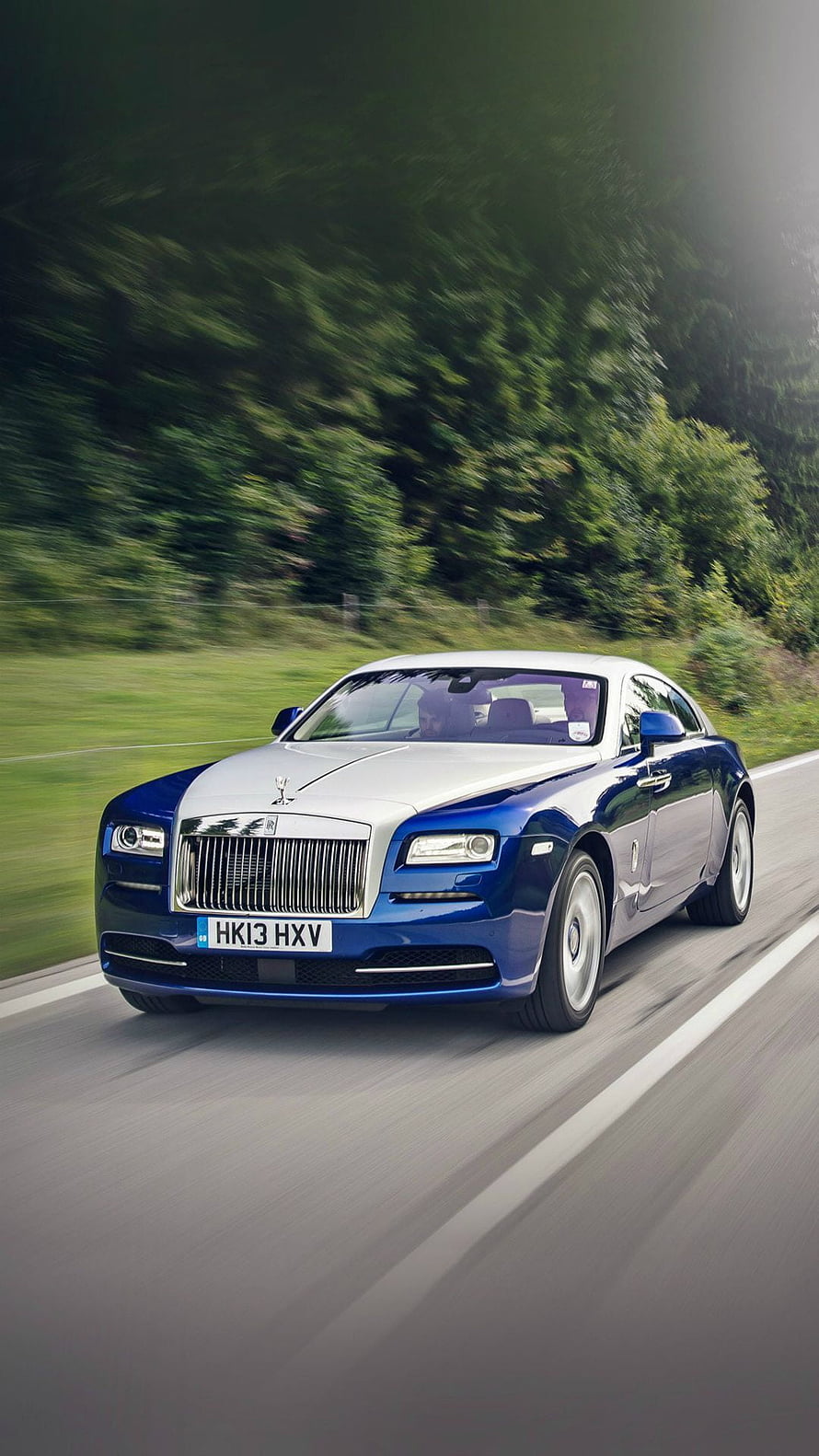 Rolls-Royce Wraith in Blue and Silver Driving on a Scenic Country Road HD phone wallpaper