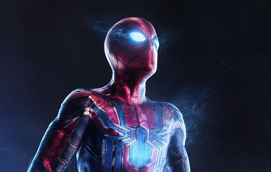 Spider-Man Iron Spider Suit with Glowing Eyes and Chest Emblem in Dark Cinematic Lighting HD wallpaper