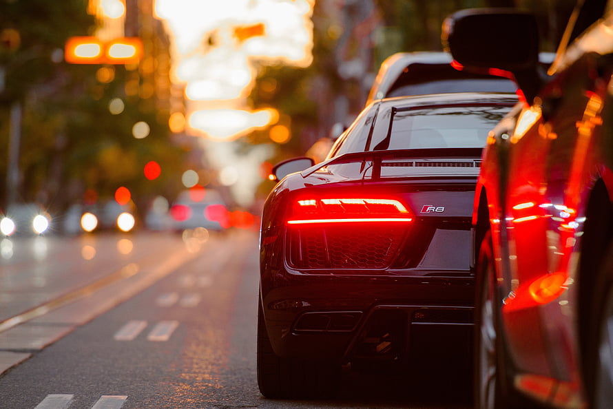 Audi R8 Rear Taillight Detail on a City Street at Golden Hour HD wallpaper