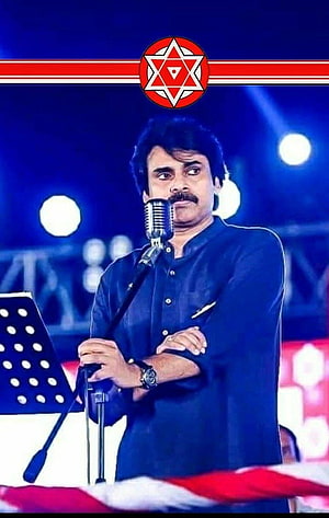 Pawan Kalyan at a JanaSena Party political rally speaking into a vintage microphone HD phone wallpaper
