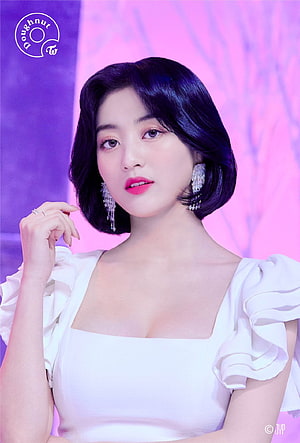 Jihyo from Twice in White Ruffled Dress with Short Bob Hair and Statement Earrings HD phone wallpaper