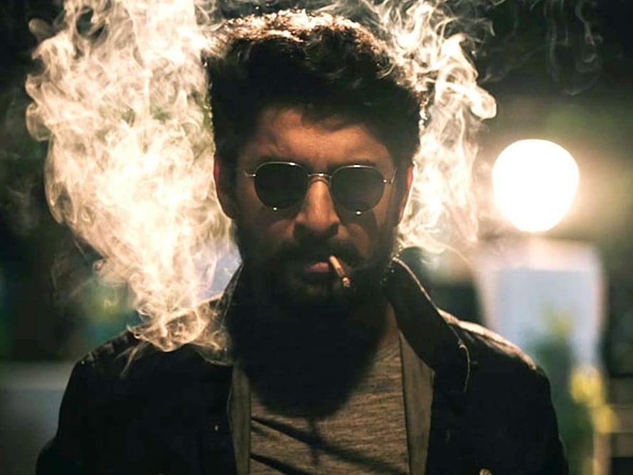 Nani in moody cinematic portrait with sunglasses and cigarette smoke HD wallpaper