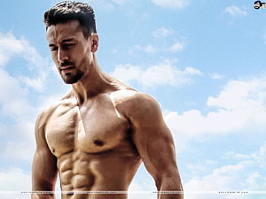 Tiger Shroff Shirtless Portrait Against Blue Sky HD wallpaper
