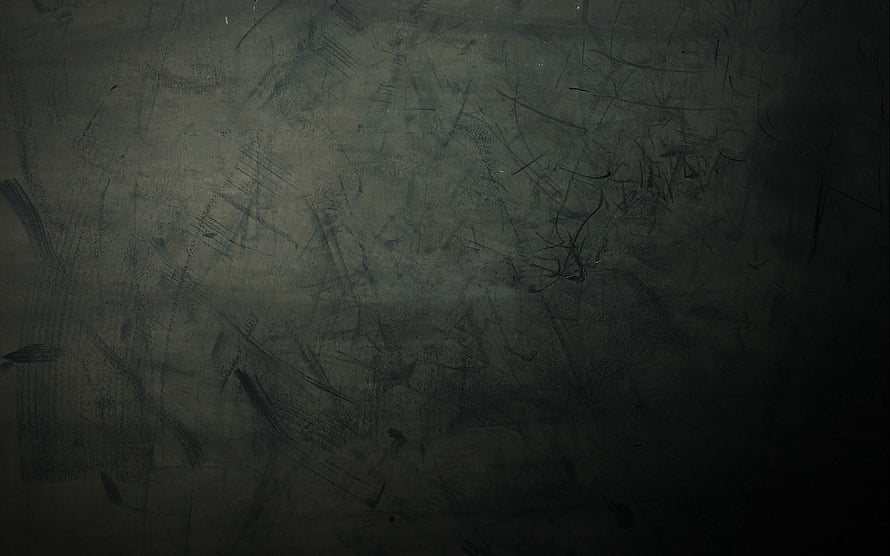 Dark scratched metal surface with gritty industrial texture and moody abstract background HD wallpaper