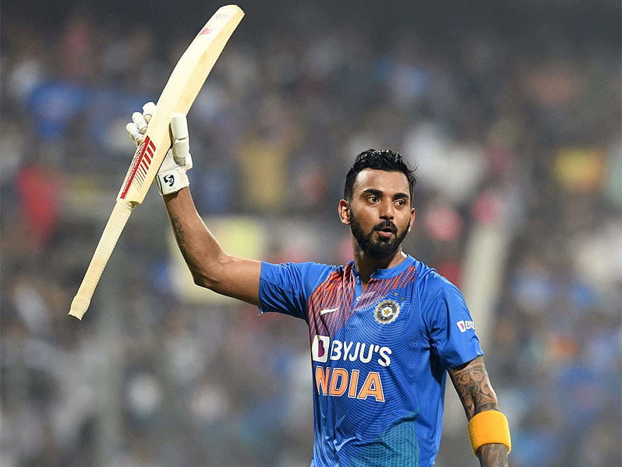KL Rahul Raising Cricket Bat in India ODI Jersey at Night Stadium HD wallpaper