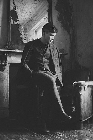 Cillian Murphy as Tommy Shelby in a moody black and white portrait HD phone wallpaper