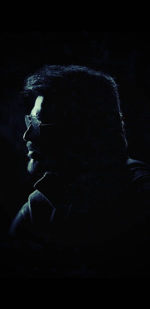 Rajinikanth dramatic profile portrait in deep blue monochrome lighting HD phone wallpaper