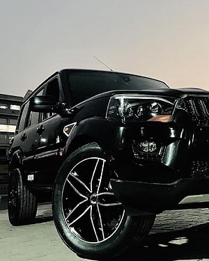 Black Mahindra Scorpio SUV with Custom Alloy Wheels and Front Bumper HD phone wallpaper