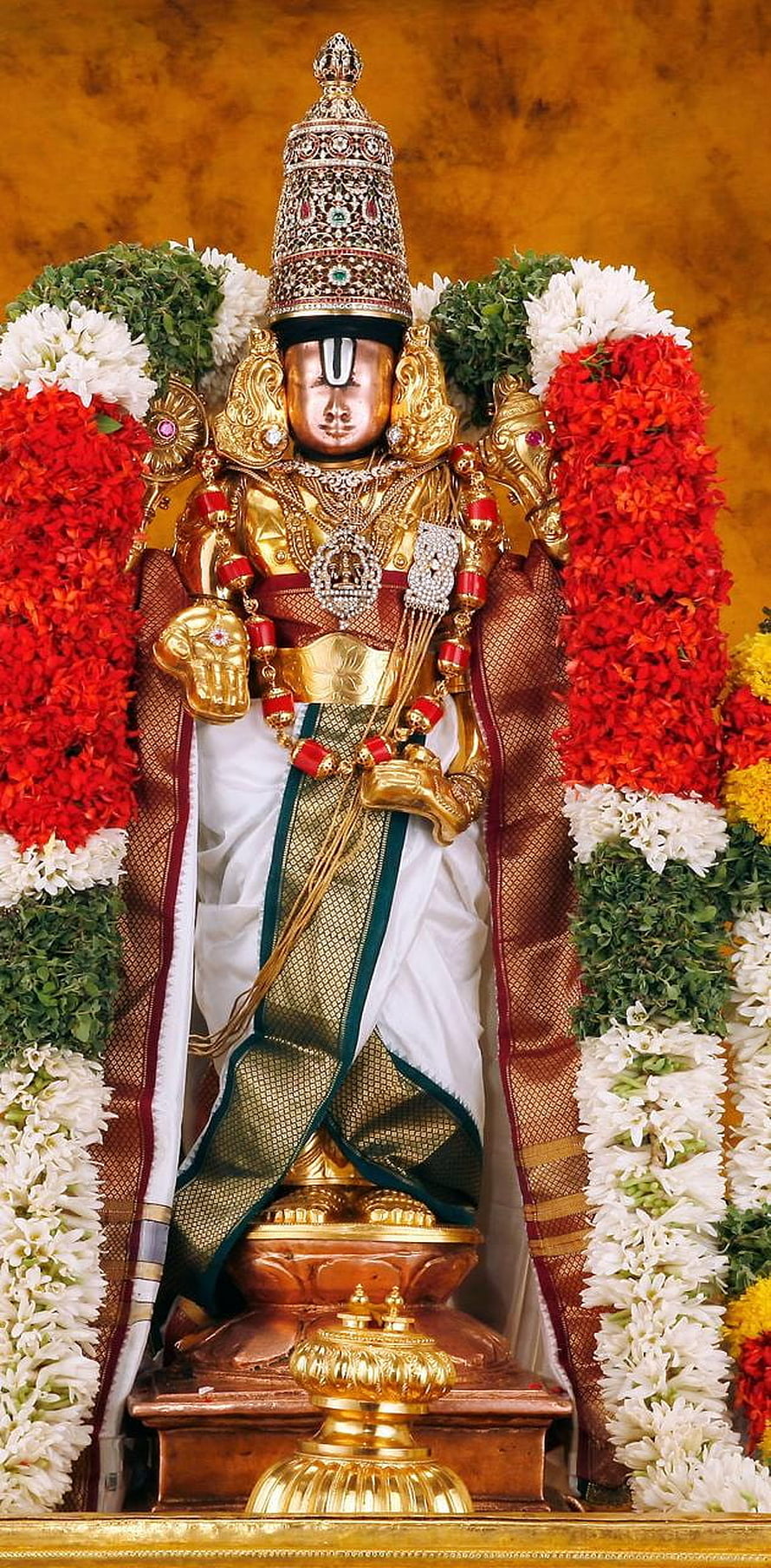 Lord Venkateswara Temple Idol Adorned With Gold Jewelry And Flower Garland HD phone wallpaper