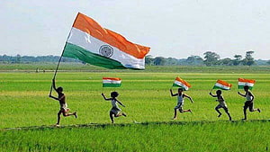 Children Running Through Green Rice Field Waving Large Indian National Flag HD wallpaper