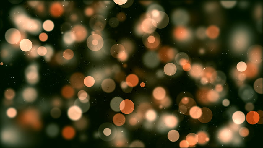 Warm Amber Bokeh Light Orbs Against Dark Background HD wallpaper