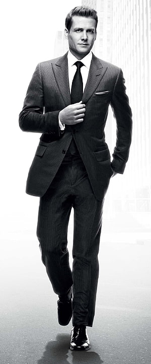 Harvey Specter in a Classic Pinstripe Suit Walking Through a Modern City HD phone wallpaper