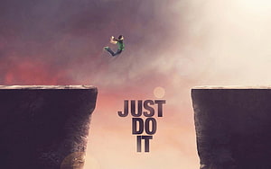 Man Leaping Across a Chasm with Just Do It Motivational Text HD wallpaper