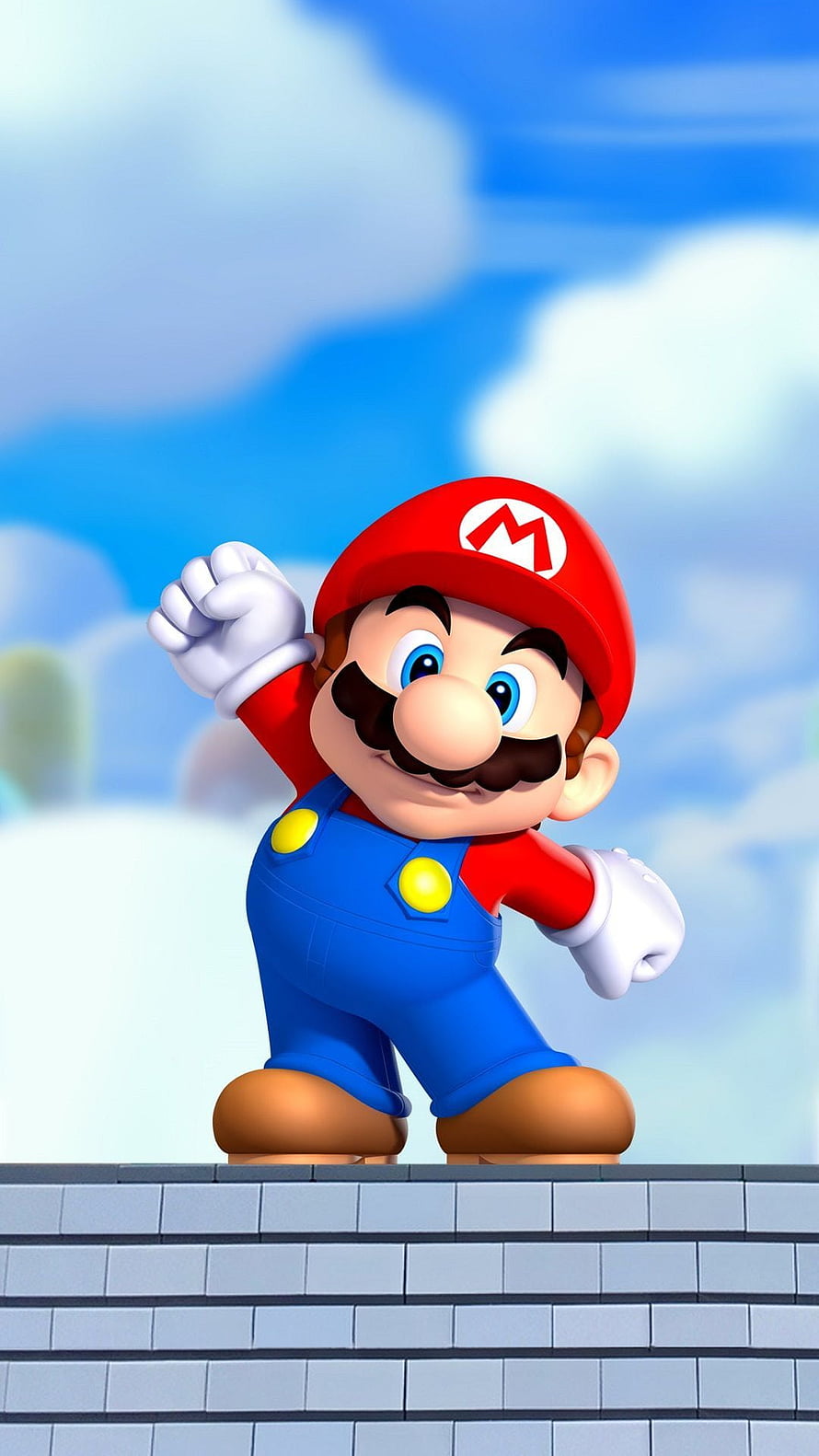 Super Mario standing on a brick platform with a bright blue sky and clouds in the background HD phone wallpaper