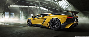 Yellow Lamborghini Aventador SVJ in Industrial Warehouse Setting HD wallpaper