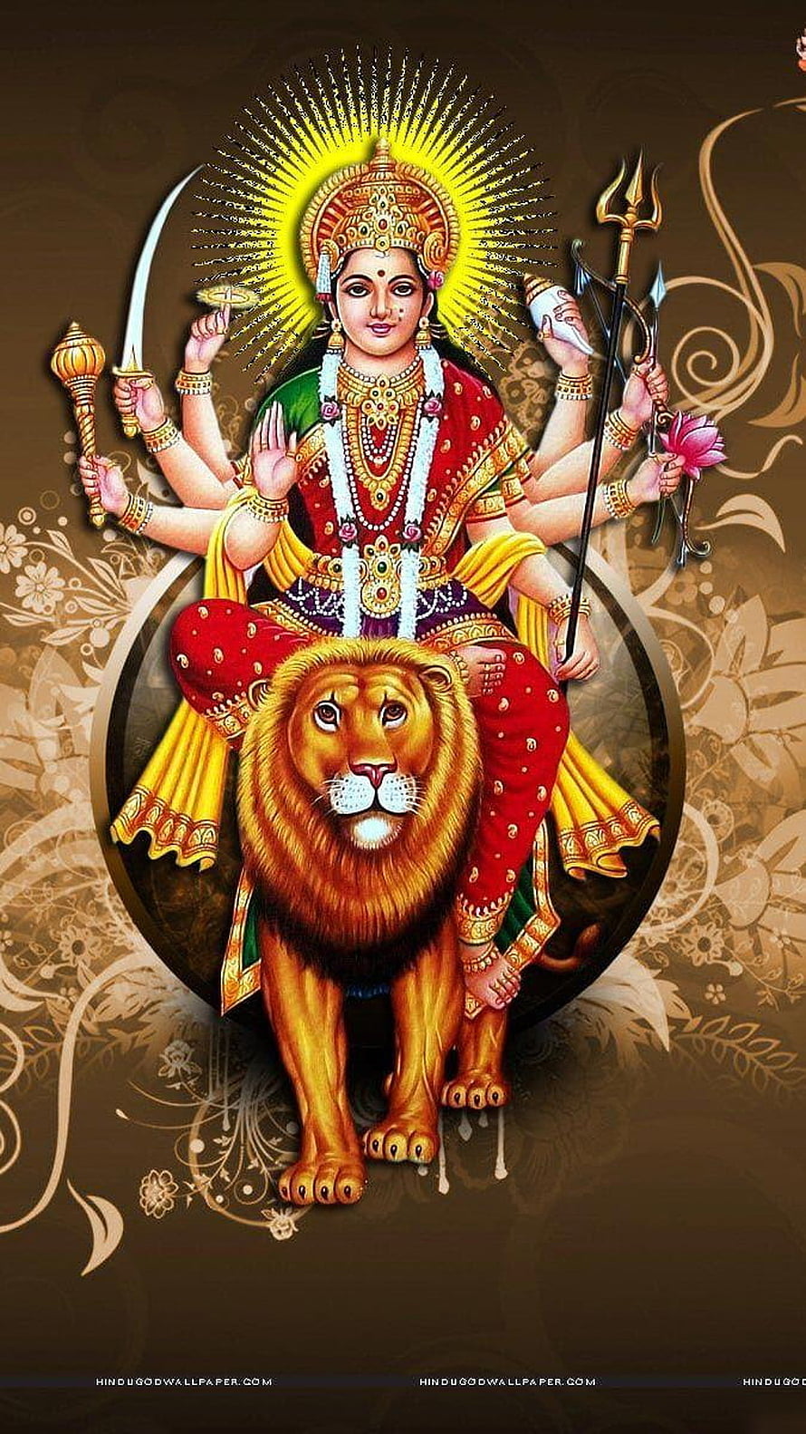 Maa Durga riding a lion with multiple arms holding weapons and a radiant golden halo HD phone wallpaper
