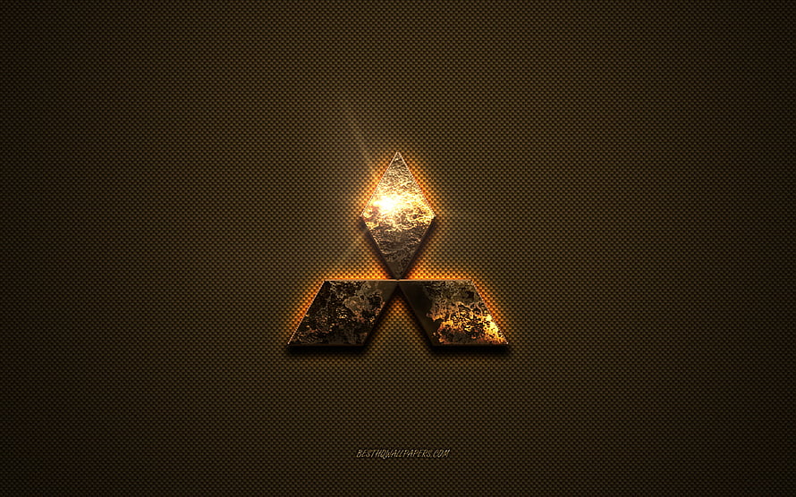 Mitsubishi three-diamond emblem with glowing golden edges on a dark textured metal surface HD wallpaper