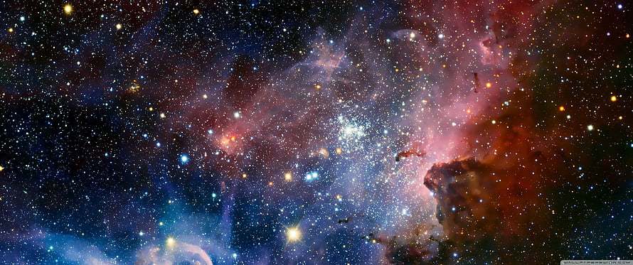 Vibrant Deep Space Nebula with Dense Star Fields and Cosmic Dust Clouds HD wallpaper