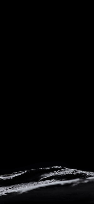 Dark Minimalist Rock Formation Against Black Background HD phone wallpaper