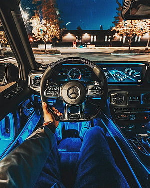 Mercedes AMG Interior at Night with Blue Ambient Lighting and Digital Dashboard HD phone wallpaper