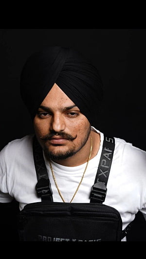 Sidhu Moose Wala Portrait in Black Turban and White Tee with Chest Bag HD phone wallpaper