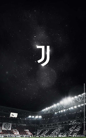 Juventus Stadium Night Scene With Glowing Logo And Crowd HD phone wallpaper