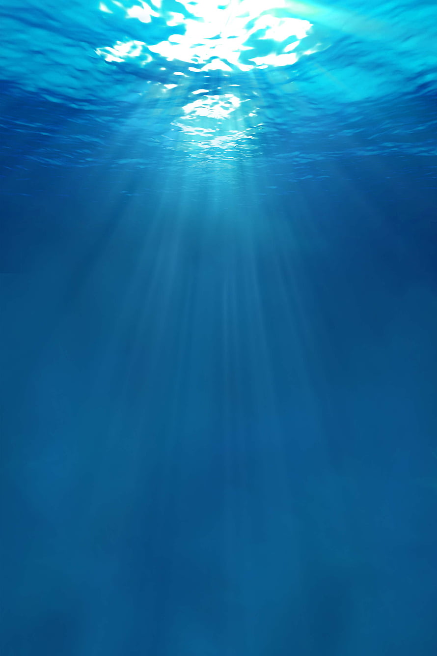 Sunlight Beams Piercing Through Deep Blue Ocean Water HD phone wallpaper
