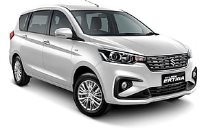 Silver Suzuki Ertiga MPV Front Three-Quarter Studio Shot HD wallpaper