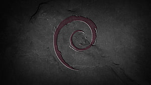 Dark Stone Surface With Red Spiral Carving and Cracked Texture HD wallpaper