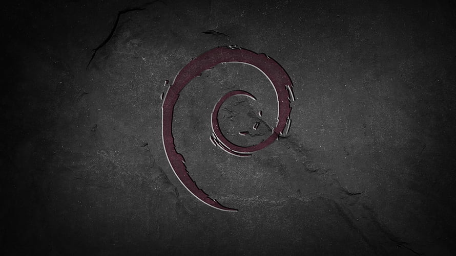 Dark Stone Surface With Red Spiral Carving and Cracked Texture HD wallpaper