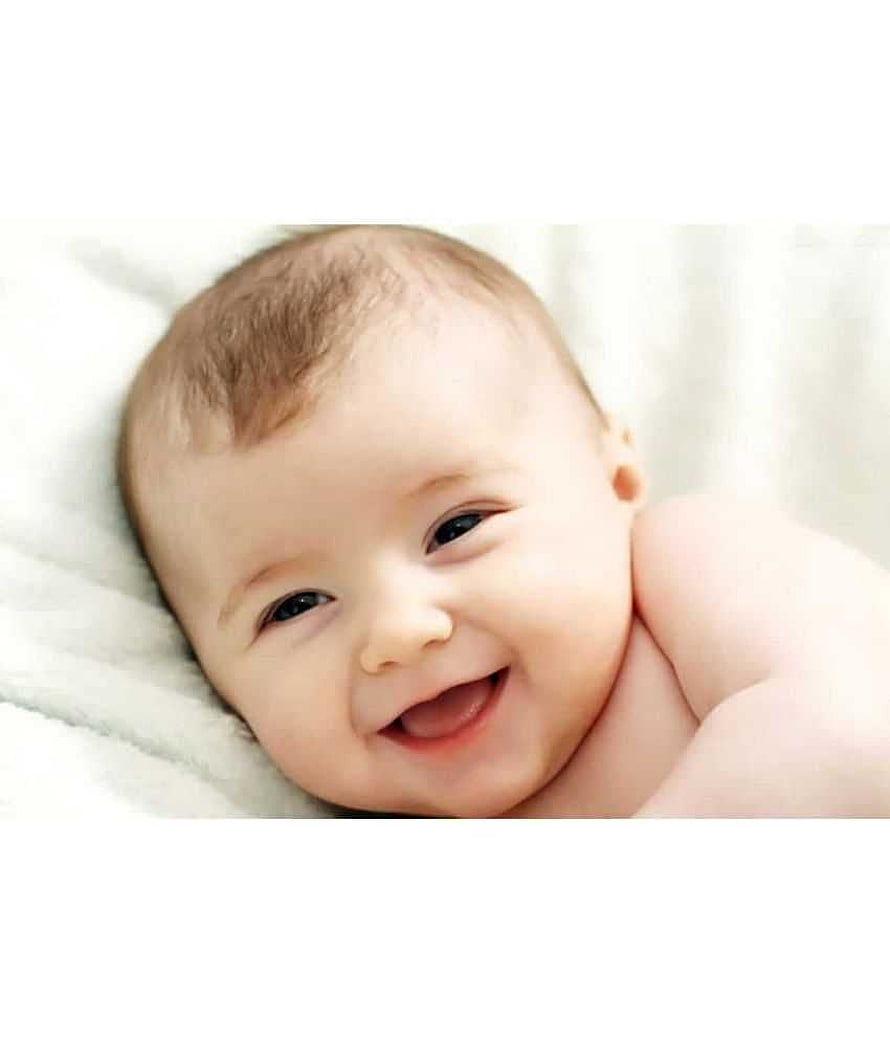 Smiling Baby Boy Lying on White Blanket with Soft Natural Light HD phone wallpaper