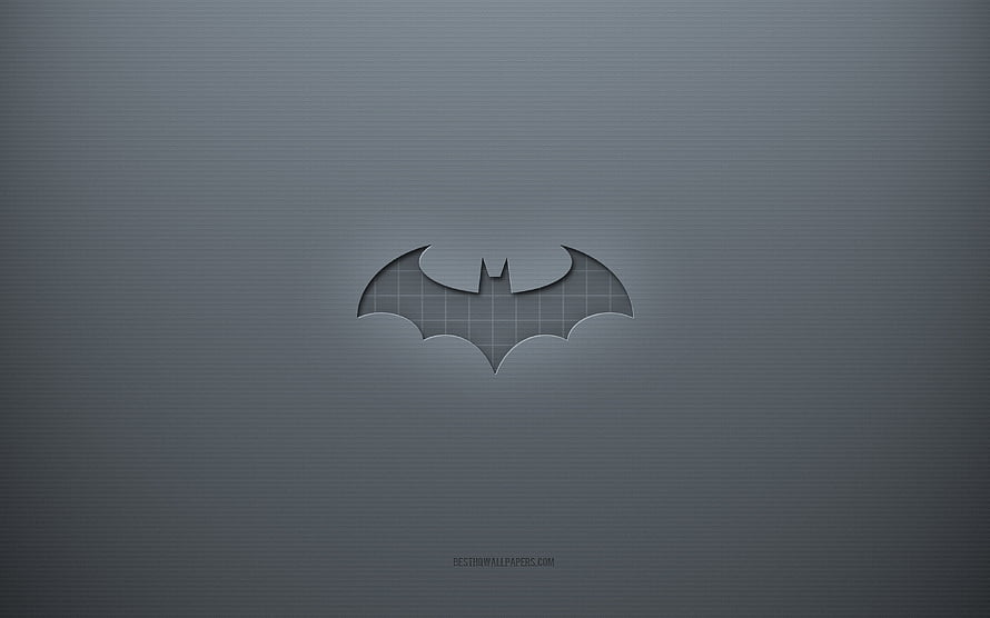 Minimalist Batman Emblem Cutout on Textured Gray Surface HD wallpaper