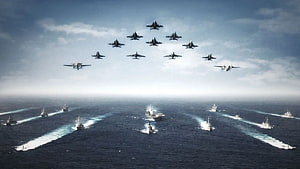 US Navy Carrier Strike Group with Fighter Jet Formation Over Open Ocean HD wallpaper