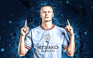 Erling Haaland in Manchester City Home Kit with Blue Neon Background HD wallpaper