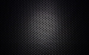 Dark Hexagonal Mesh Pattern with Central Glare and Abstract Geometric Texture HD wallpaper
