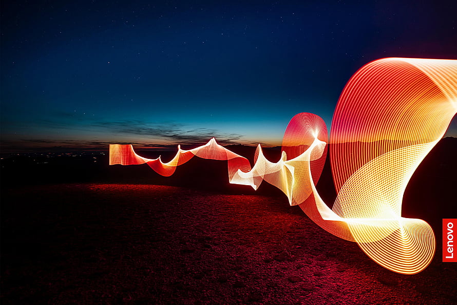 Lenovo Light Painting Artwork with Flowing Orange Ribbons Against a Starry Night Sky HD wallpaper